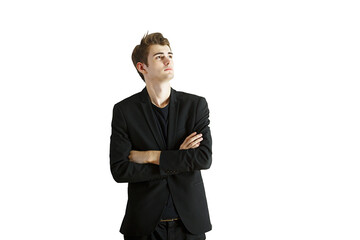 Poster - Portrait of a young man wearing asuit, crossing his arms, and looking upward confidently. Isolated on a white background, closeup concept