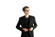 © peshkova - Man in asuit adjusting his jacket, wearing glasses, standing against a clean white background. Professional attire concept