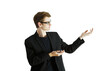 © peshkova - Young man in asuit and glasses, gesturing with open hands, isolated on a white background. Concept of presentation or offering