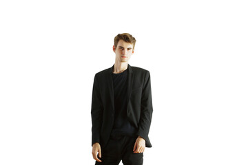 Poster - Young man in a formalblazer standing confidently, wearing a casual dark shirt. Isolated on a clean white background. Business style