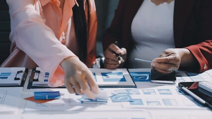 Wall Mural - close up ux developer and ui designer brainstorming about mobile app interface wireframe design on t