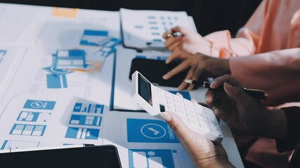 Wall Mural - close up ux developer and ui designer brainstorming about mobile app interface wireframe design on t