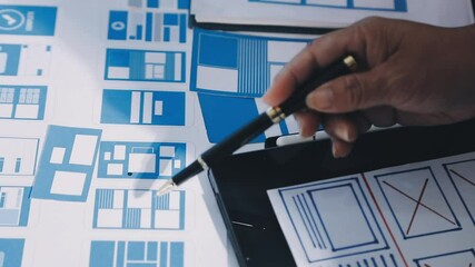 Wall Mural - close up ux developer and ui designer brainstorming about mobile app interface wireframe design on t