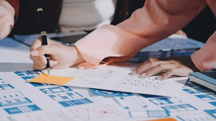Wall Mural - close up ux developer and ui designer brainstorming about mobile app interface wireframe design on t