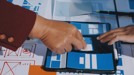 Wall Mural - close up ux developer and ui designer brainstorming about mobile app interface wireframe design on t