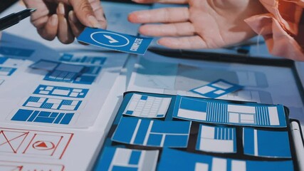 Wall Mural - close up ux developer and ui designer brainstorming about mobile app interface wireframe design on t