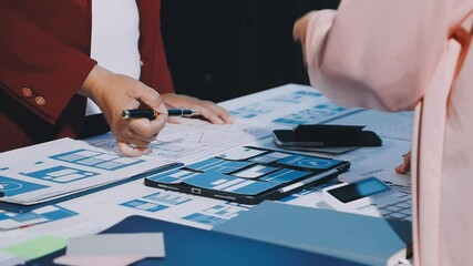 Wall Mural - close up ux developer and ui designer brainstorming about mobile app interface wireframe design on t