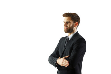 Poster - Confident man in a formal suit with crossed arms, standing and looking to the side, professionally captured on a clean white background