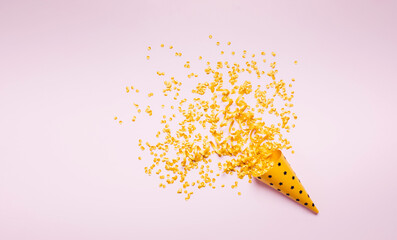 Wall Mural - Confetti glitter with gold color in vibrant mood for celebration and party concepts.decoration ornaments background