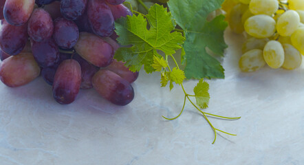 Wall Mural - Red and white grapes on the table