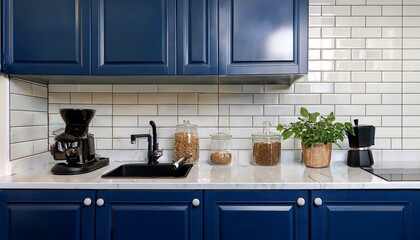 Wall Mural - modern kitchen corner with navy blue cabinets white subway tile backsplash and marble countertop featuring an espresso machine grinder and coffee accessories