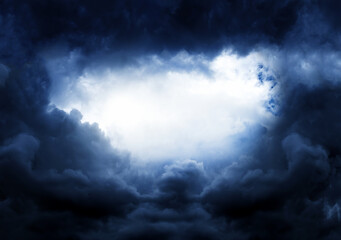 Wall Mural - hole in the storm clouds