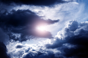 Wall Mural - storm clouds with a sunlight