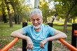 © Marko Geber - Portrait of a senior man exercising at outdoor fitness park in autumn