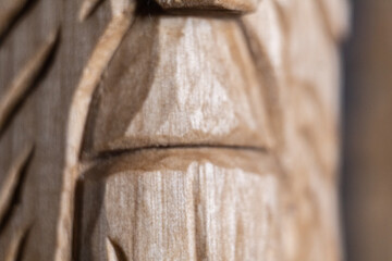 carved face made of wood