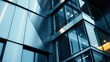 © Vibrant Visions Pixe - A modern building's exterior featuring a geometric facade of sleek, reflective panels and expansive windows that capture the soft glow of interior lighting.