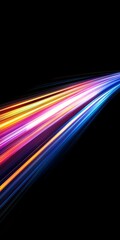 Wall Mural - vibrant light trails with motion blur are captured using long exposure photography against a dark ba
