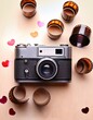 © swan - Vintage camera and film rolls surrounded by hearts.