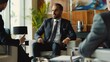 © Dot - Business man representing business mogul discussing highstakes investment opportunities with financial advisors and business consultants aiming for substantial returns in a luxurious office