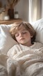 © Sergiy - Cozy child sleeping peacefully during a tranquil indoor nap on a white bed