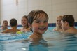 © SY - Happy toddler enjoys swimming pool fun with other children. Perfect for family fun, summer, and water safety themes.