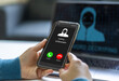 © JOURNEY STUDIO7 - Phone scam alert with hacker and scammer calling unknown number, cybercrime, data theft, phishing attempt, fraud alert, digital security threat, cyber attack warning technology and crime concept