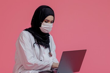 Wall Mural - young muslim woman looks in laptop beautiful girl in white suit