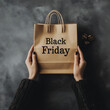 © NNS Studio - Black Friday paper bag held by hands retail advertising marketing campaigns seasonal discounts promotional content sophisticated web design digital minimalist grey simple holiday event shopping