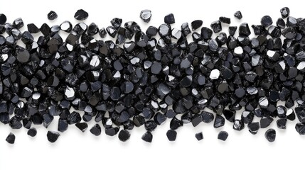 Poster - Black coal granules arranged neatly on a clean white surface showcasing texture and color variations for industrial or artistic uses.