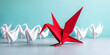 © tomertu - Concept image of paper birds following the leader. Metaphor of teamwork and success