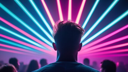 Wall Mural - vivid laser beams in multiple colors dancing across a crowd of people at a concert, creating a high 
