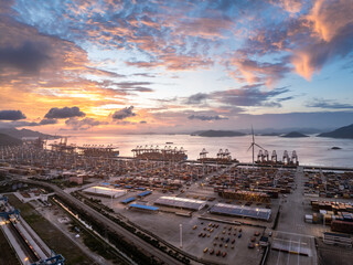 Aufkleber - Aerial view of container port and seaside natural scenery at sunrise