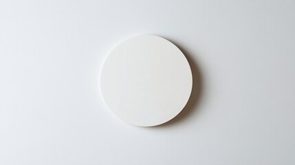 Wall Mural - Minimalist White Circle on a Plain White Background: A Study in Simplicity and Space