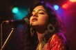 © Panuwat - Young woman singing into microphone stage She is indian