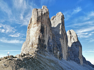 Wall Mural - Tre Cime high iconic rocks in Italian Dolomites autumn landscape