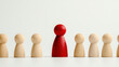 © Owl.Studio - Delegation and leadership, Leadership concept with red figure among wooden figures, symbolizing guidance and influence