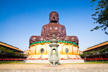 Wall Mural - The Giant Buddha statue is in the Baguashan Scenic Area in Changhua City, Taiwan.