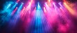 © Jittapon - Dramatic and vivid lighting transforms the concert stage into a captivating focal point creating an electrifying atmosphere for a vibrant music performance or festival event