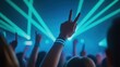 © Kannika - Galaxy outer space party Hands raised in excitement at a vibrant concert with colorful laser lights.