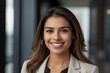 © Fathor - Headshot close up face portrait of young happy smiling Hispanic businesswoman,