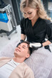 © Svitlana - Man visiting cosmetologist for an ultrasonic scrubber procedure