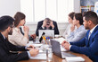 © Prostock-studio - Stressed boss having problem at business meeting in office