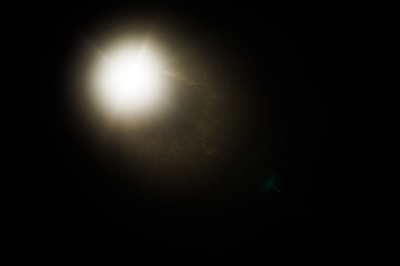 Fototapete - Easy to add lens flare effects for overlay designs or screen blending mode to make high-quality images. Abstract sun burst, digital flare, iridescent glare over black background.