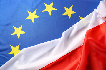 Wall Mural - Flags of European Union and Poland, closeup