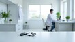 © anyatachka95 - A female physician sits at a table with a stethoscope on it