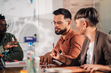 Business people collaborating on project during office meeting