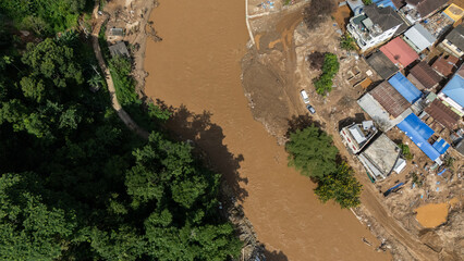 Wall Mural - Aerial view of Sai river a river that forms the natural border between Thailand and Myanmar at Tachileik and Mae Sai districts.