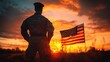 © Yuliya - Soldier Silhouette with American Flag at Sunset for Memorial Day Veterans Day Patriotism