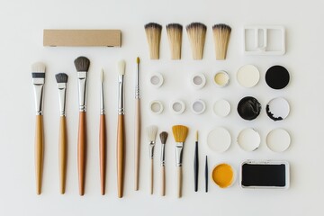 Aufkleber - Brushes, scissors, glue, and small acrylic paints neatly arranged on a white surface with space available for additional text or notes. Generative AI