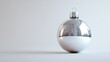 © HuynhThiThuy - A sleek silver ball ornament with a reflective metallic surface, perfectly centered, on a clean white background, capturing sharp reflections and delicate highlights, modern minimalism, hd quality.
